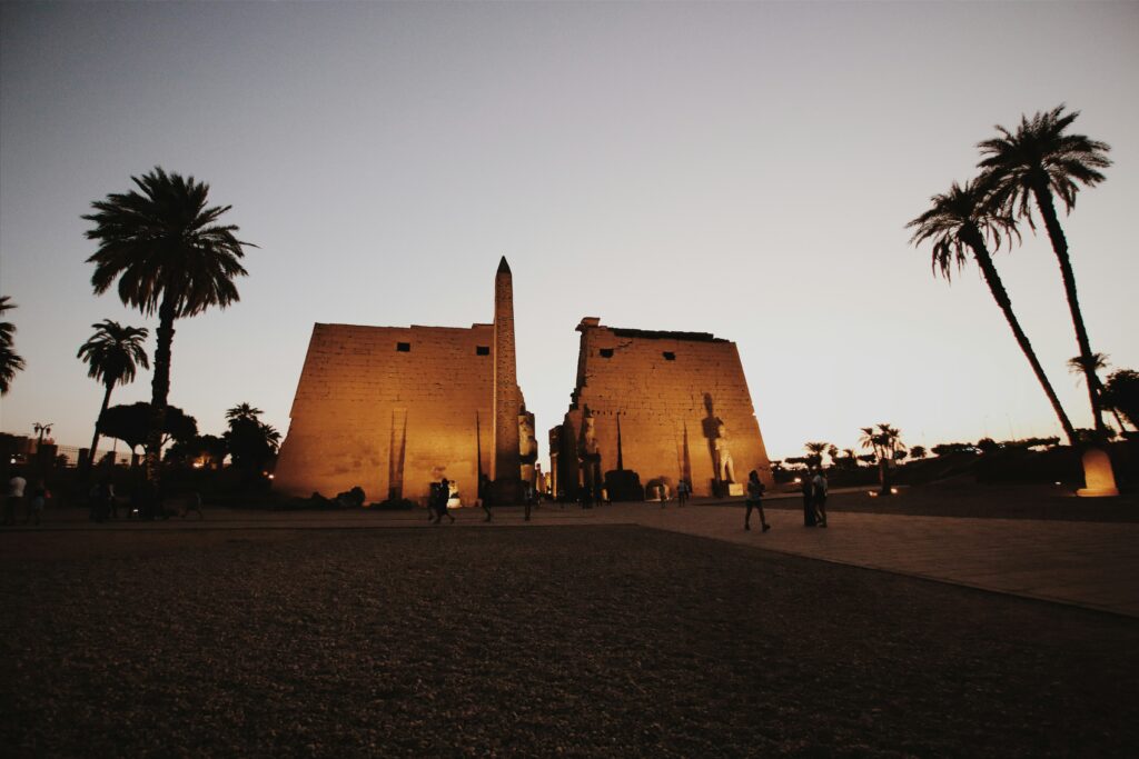 temple obelisk at night